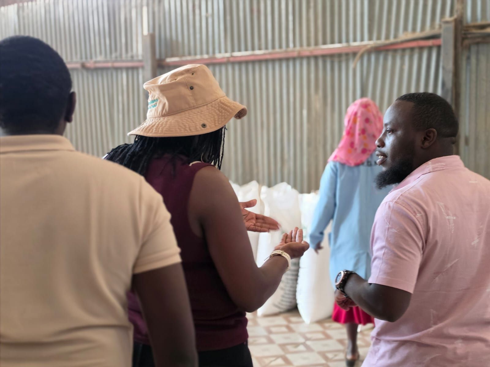 ENKOP founder Lucy Nyoike and Carbon Markets Lead Zecharia Mwangi on partner site in Mwea, Kenya
